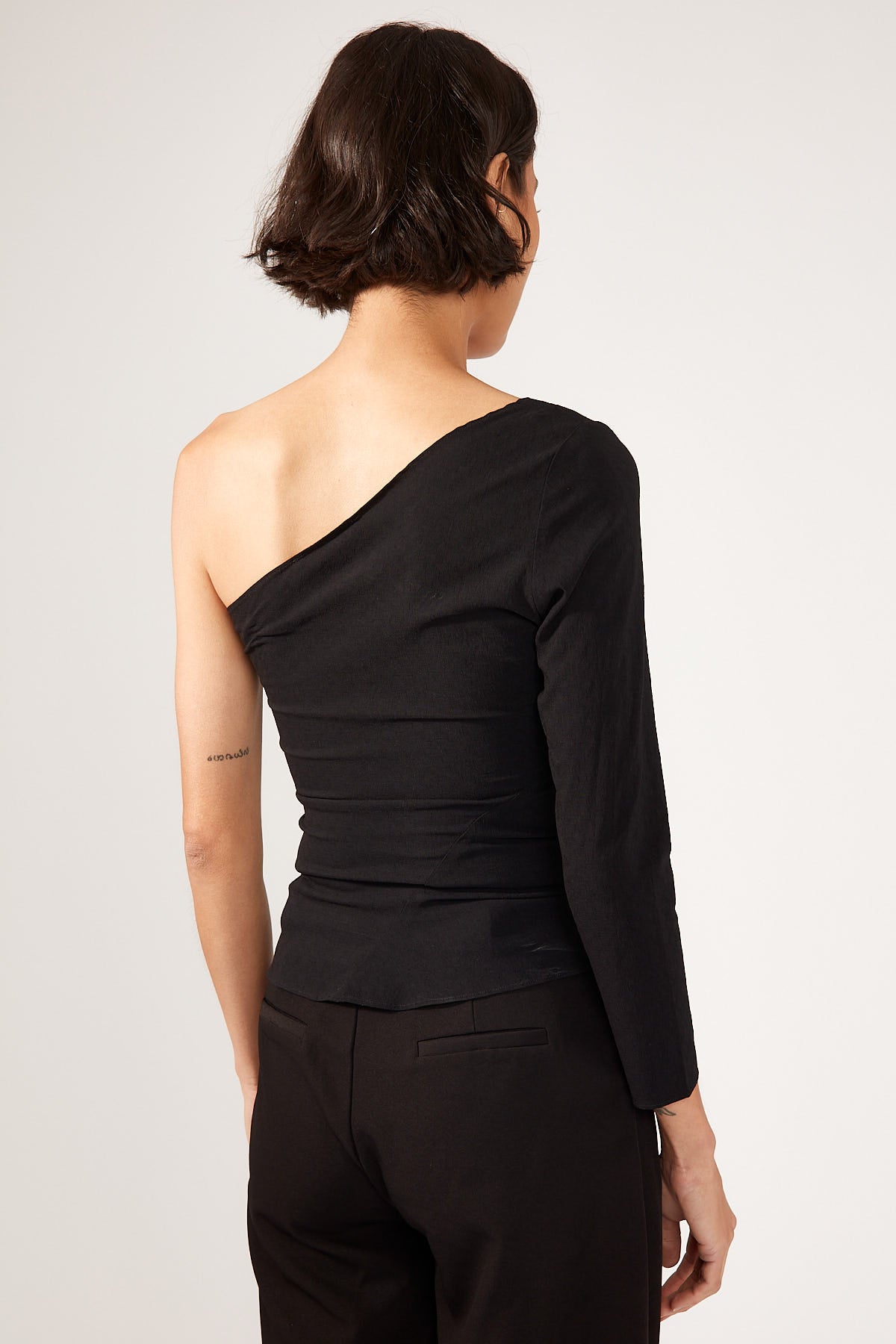 Perfect Stranger Britta Tucked Asymmetrical Top Black